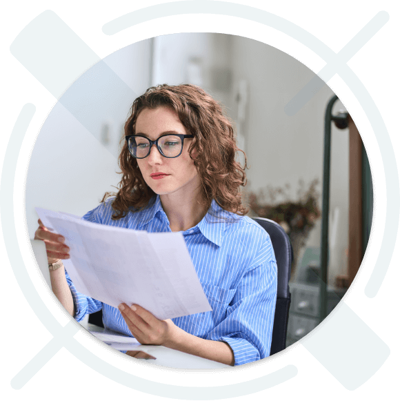 Woman checking financial documents.